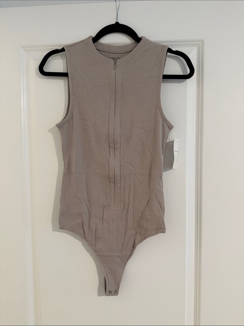 Abercrombie & Fitch Sleeveless Zip-Front Ribbed Bodysuit in Taupe